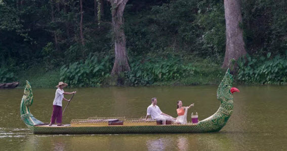 Image of boat going down river in Angkor 